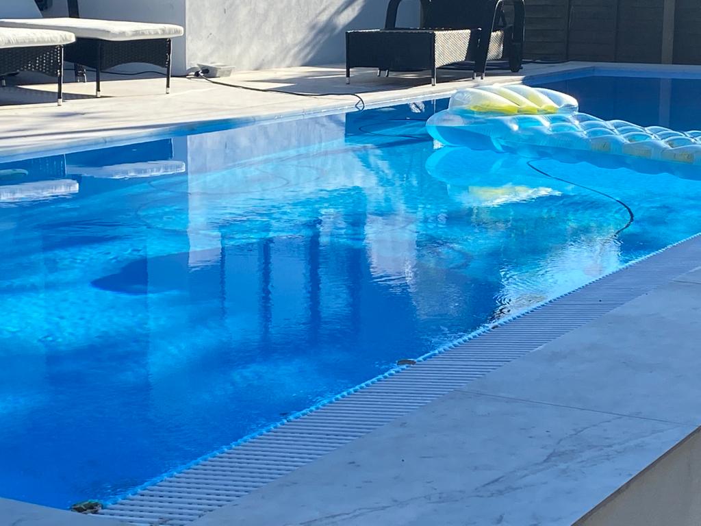 overflow / infinity edge swimming pool example - sold by my pool direct - united kingdom